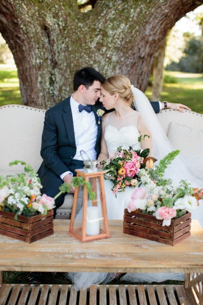 Sitting on vintage couch under tree Hunter_Gibney_Ais_Portraits_AisPortraitsGibneyRibaultWedding453