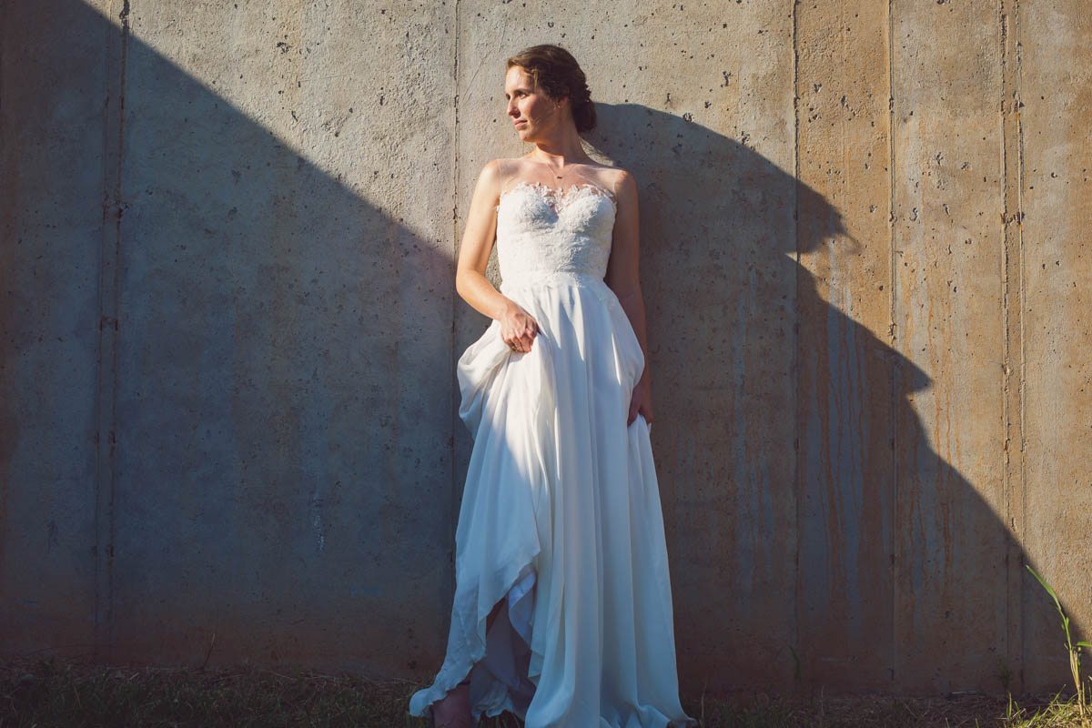 Bride against wall in her gown - Adam for W.Scott Chester
