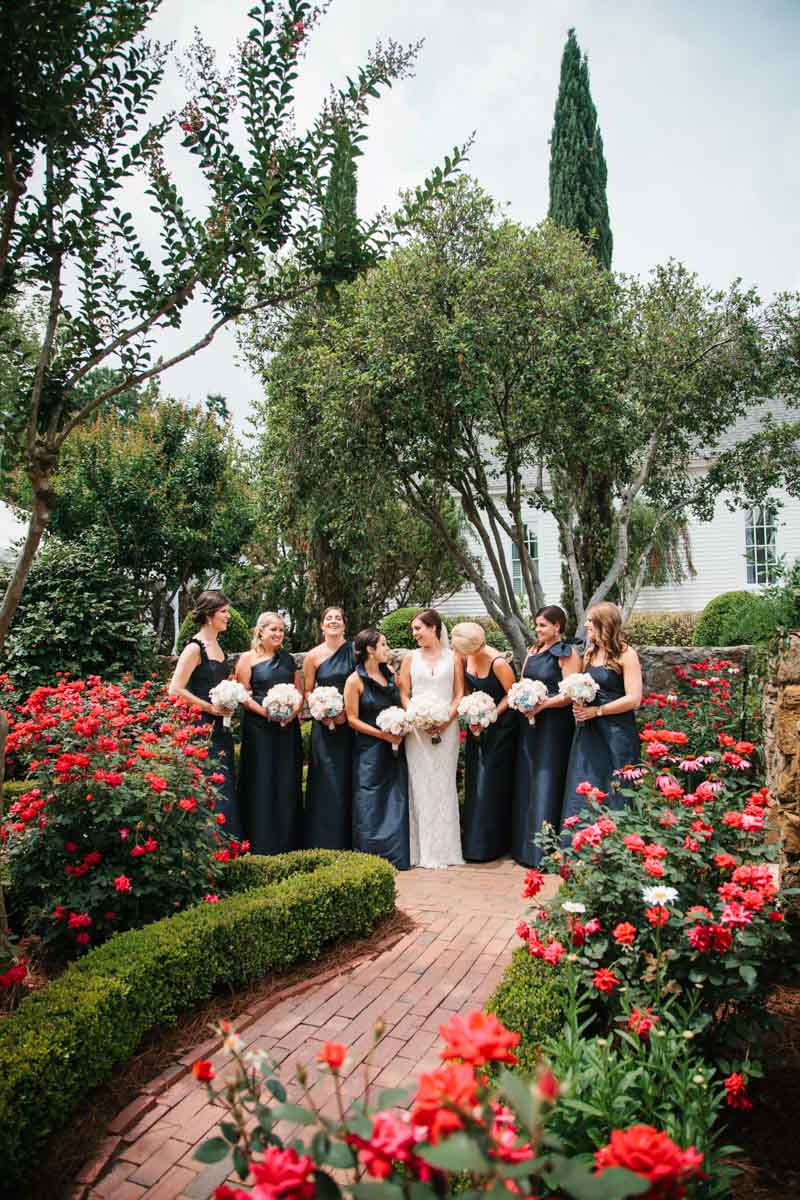 Bridesmaids outside with flowers