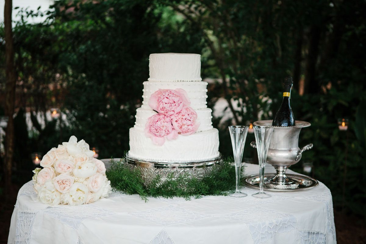 White Tiered Cake with Pink Flowers