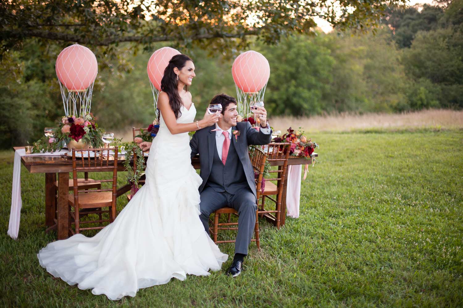 bride-and-groom-at-outdoor-reception-chey-photography-sweet-meadow-109