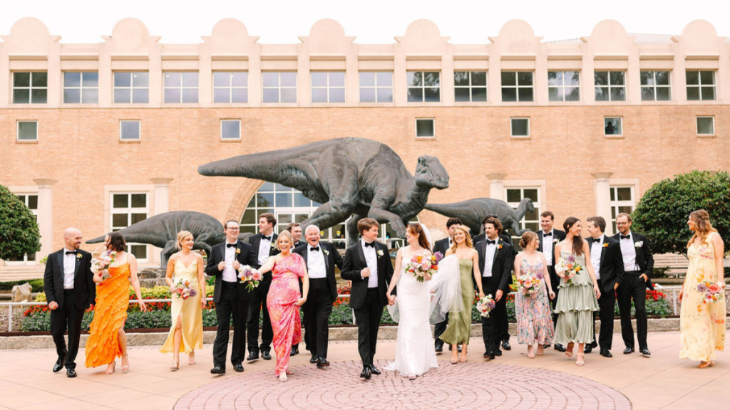 Chloe and Mark with their wedding party outside Fernbank Museum of Natural History